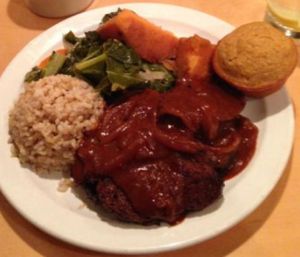 vegan BBQ tempeh, steamed collard greens with ginger, brown rice, sweet potato and vegan corn muffin at Om Cafe in Ferndale