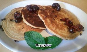Brunch Special - please call for availability.  Homemade vegan Traverse City Cherry & Chocolate Chip Pancakes! A brunch special, brunches are every Saturday from 11am - 4pm. at Om Cafe in Ferndale