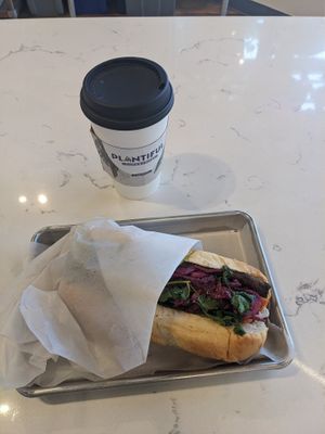 Banh mi sandwich and a mushroom latte at Plantiful Superfoods - Capitol Hill in Seattle