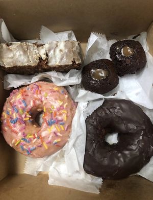 Homer & chocolate donuts, caramel salted brownies, pumpkin bread loaf.  at Sweet Theory Baking Co. in Jacksonville