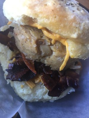 Vegan sausage and coconut bacon breakfast sandwich with vegan cheese at Sweet Theory Baking Co. in Jacksonville