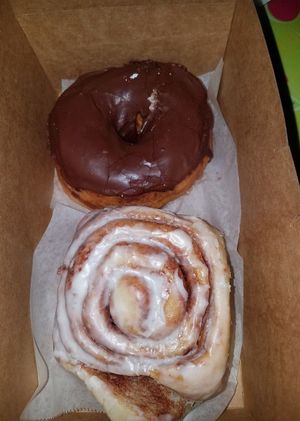 Cinnamon roll and chocolate doughnut at Sweet Theory Baking Co. in Jacksonville