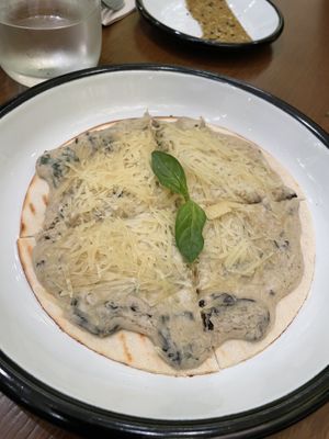 Mushroom truffle pizza   at Wild & The Moon in Doha