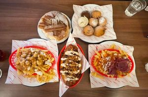 top: bacon pancakes, deep fried oreos. bottom: poutine loaded fries, smokin’ dog, buffa-loaded fries  at Dimpsy's Diner in Plymouth
