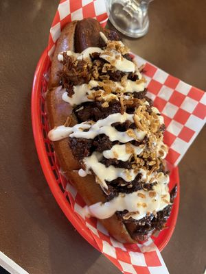 Smoking dog. Hot dog with BBQ brisket   at Dimpsy's Diner in Plymouth