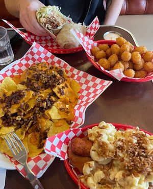 Cheese and Bacon loaded nachos, Tater Tots, Mac and Cheese with crispy onions loaded hotdog and a Special Chicken and Bacon Wrap at Dimpsy's Diner in Plymouth