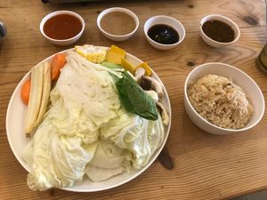 they bring a lot of cabbage, I dipped it into the peanut sauce, yum at Kinn's The Buta in Udon Thani