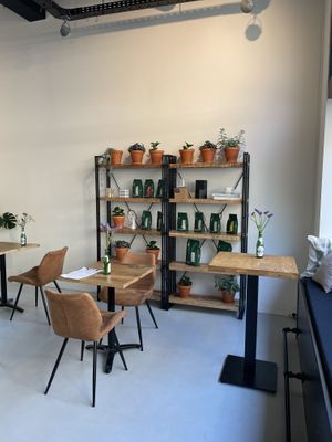 Interior with giraffe coffee variety decoration   at Crave Coffee & Bakery in Rotterdam