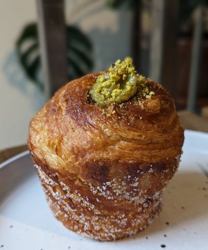pistachio cruffin at Crave Coffee & Bakery in Rotterdam