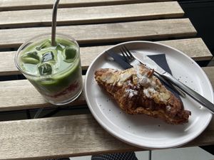 Strawberry matcha latte (quite tasty) and almond croissant (decent flavour, but too dry) at Crave Coffee & Bakery in Rotterdam