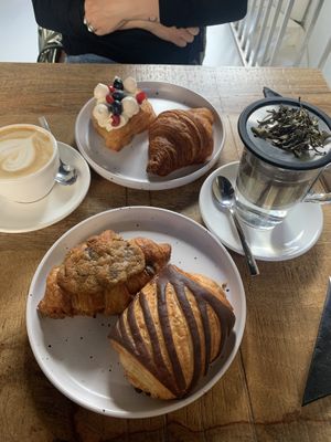 Crookie, pain au chocolat, mango pavlova danish, croissant    at Crave Coffee & Bakery in Rotterdam