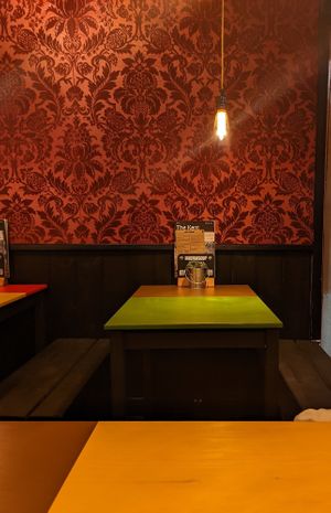 Cosy booth indoor area at Nincomsoup in Hythe