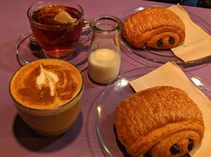 Chai latte, tea and pain au chocolate at Nincomsoup in Hythe