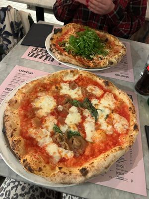 The vegan on is the one with lots of rocket but they were both huge! at Pizza Beppe in Amsterdam