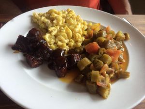BBQ Tempeh, vegan Mac & Cheese, okra and tomatoes at Southern Charm Kitchen in Gainesville