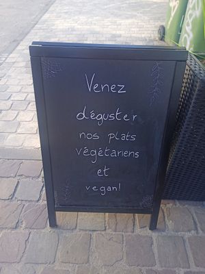 At the entrance at La Vallée du Kashmir in Brussels