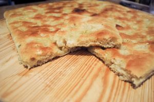 Tipical genoese focaccia with organic ingredients at La Cucina di Giuditta in Genoa
