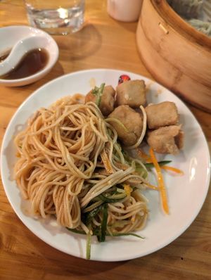 Dan Dan noodles (left) and salt and pepper tofu (right). at Chiho Bistro in Seattle