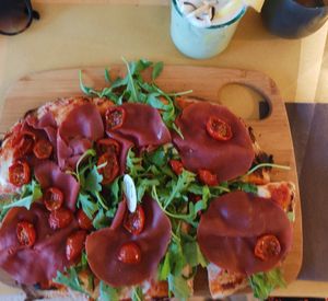 Pinsa with veg cold cuts and soft veg cheese (stracchino) at Amato in Mornago