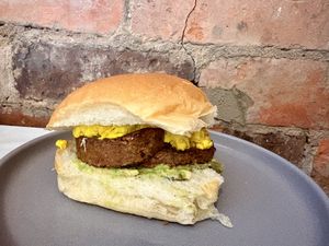 Breakfast roll with avocado, vegan haggis and tofu scramble   at Papercup Motherwell in Motherwell