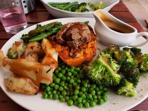 Vegan Roast of a butternut squash and 'meatfree stuffing'. Greens on far side I payed extra for. at The Kingfisher in Northwich