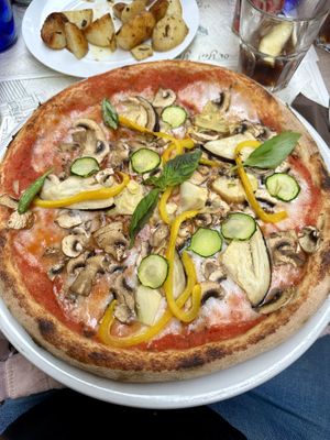 Pizza vegetariana with vegan mozzarella   at Buca Niccolini in Florence