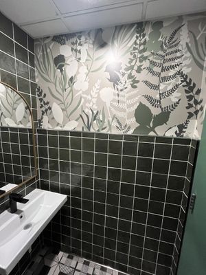 Bathroom with cool wallpaper   at Fresh Kitchen + Juice Bar in Oakville