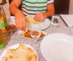 Aloo paratha, nan, Red letils stew, An eggplant dish with red curry and spicy mushrooms with potato stew. at Maharaja in Ramla