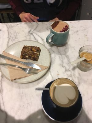 Hot chocolate, horicha matcha and granola bar  at Fauna Cafe in Edinburgh