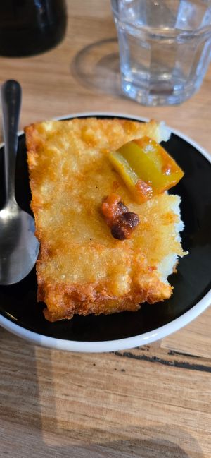 A half eaten hash brown - too delicious to take a photo of before digging in! at Larder in Daylesford