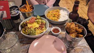 All gluten free L-R  - nachos, sweet potato fries, mago curry and popcorn cauliflower. at The Good Grub in Eastbourne