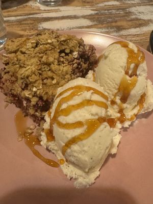 Berry crumble with ice cream (vegan)   at The Good Grub in Eastbourne