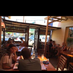 outside seating at Cafe des Amis in Paia