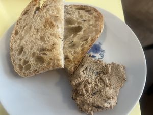 Toasted bread with whipped tofu spread which automatically comes with soup  at Kultura Diktuet in Astana