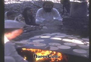 Indian ladies hand made chapaties and cooked them on these griddles day and night to feed over 100,000 people, three meals per day, for 3 days.  at Vegetarian Underground Restaurant in Cypress