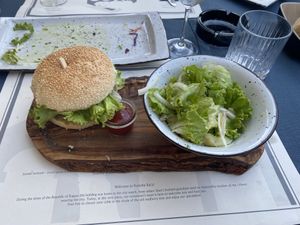 Beyond Burger with potato saladd  at Konoba Baća  in Ston