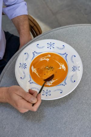 Pumpkin cream soup with coconut milk at Nom Nom in Bucharest