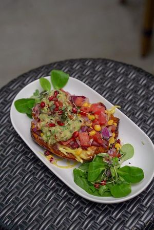 Sweet potatoes with guacamole at Nom Nom in Bucharest