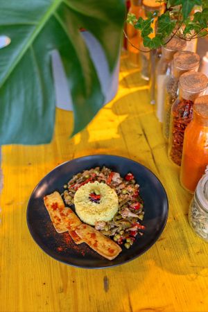 Rice with curry and vegetables at Nom Nom in Bucharest