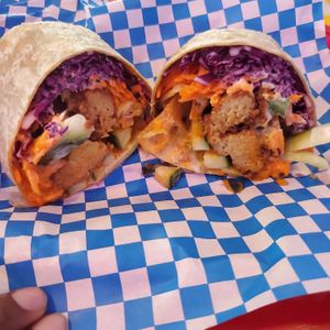 Buffalo Wrap: Buffalo Tempeh, cucumber,, red cabbage, carrots, ranch 🔥😋 🔥 at Dale and Dollops in Ocean Grove