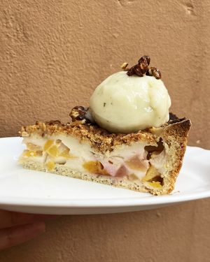 Peach&Nectarin Custard pie: crispy cake with vegan custard, pistachio ice-cream and caramelized pistachios at Nagotove - Наготове in Moscow