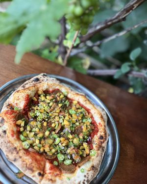 Sex Mex Pizza with seitan homemade chorizo sausages, chipotle sauce, okra and peach salsa at Nagotove - Наготове in Moscow