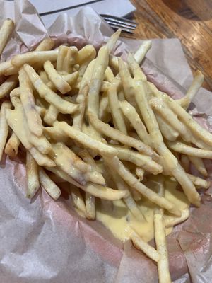 Cheese fries. Nice spice and amazing cheese   at Green New American Vegetarian in Tempe