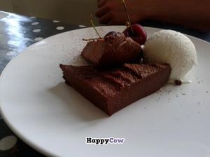 Chocolate brownie with ice cream at ORB Cafe in Edinburgh