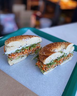 Our Wild Avocado Bagel Sandwich: Tofutti vegan cream cheese, agave marinated carrots, fresh avocado, arugula & our lemon vinaigrette on a toasted everything bagel! at Whale Bites Cafe in Depoe Bay