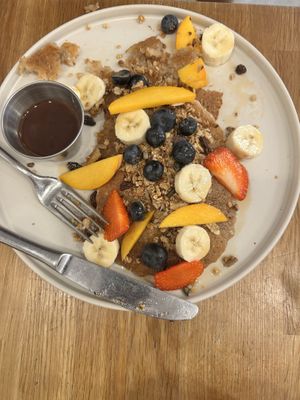 Pancakes with granola. Fruit and chocolate ganache   at botànic in Barcelona