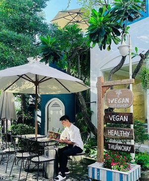 Nice decoration outside but hot in July  at IVEGAN SUPERSHOP BEN THANH - Healthy Plant Based Cafe in Ho Chi Minh City