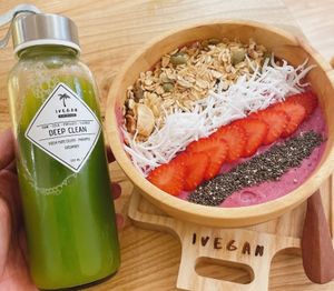 Celery juice & pink up smoothie bowl  at IVEGAN SUPERSHOP BEN THANH - Healthy Plant Based Cafe in Ho Chi Minh City