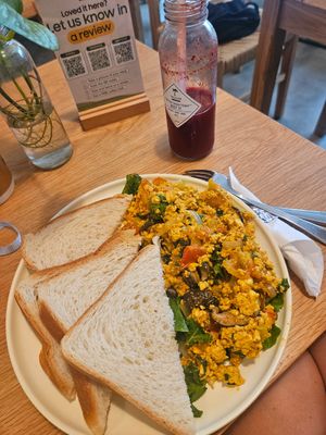 Scrambled tofu and juice at IVEGAN SUPERSHOP BEN THANH - Healthy Plant Based Cafe in Ho Chi Minh City