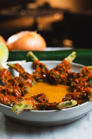 Broccolini Bites With Spanish Stew Cream  at La Huerta Funky Castizo in Madrid